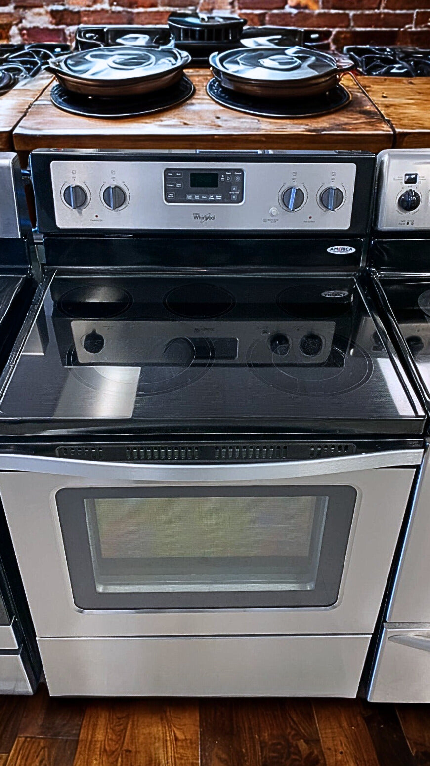 Whirlpool 30-Inch Wide Electric Range with 5.3 cu. ft. Capacity and Frozen Bake™ Technology (Model WFE515S0ES)