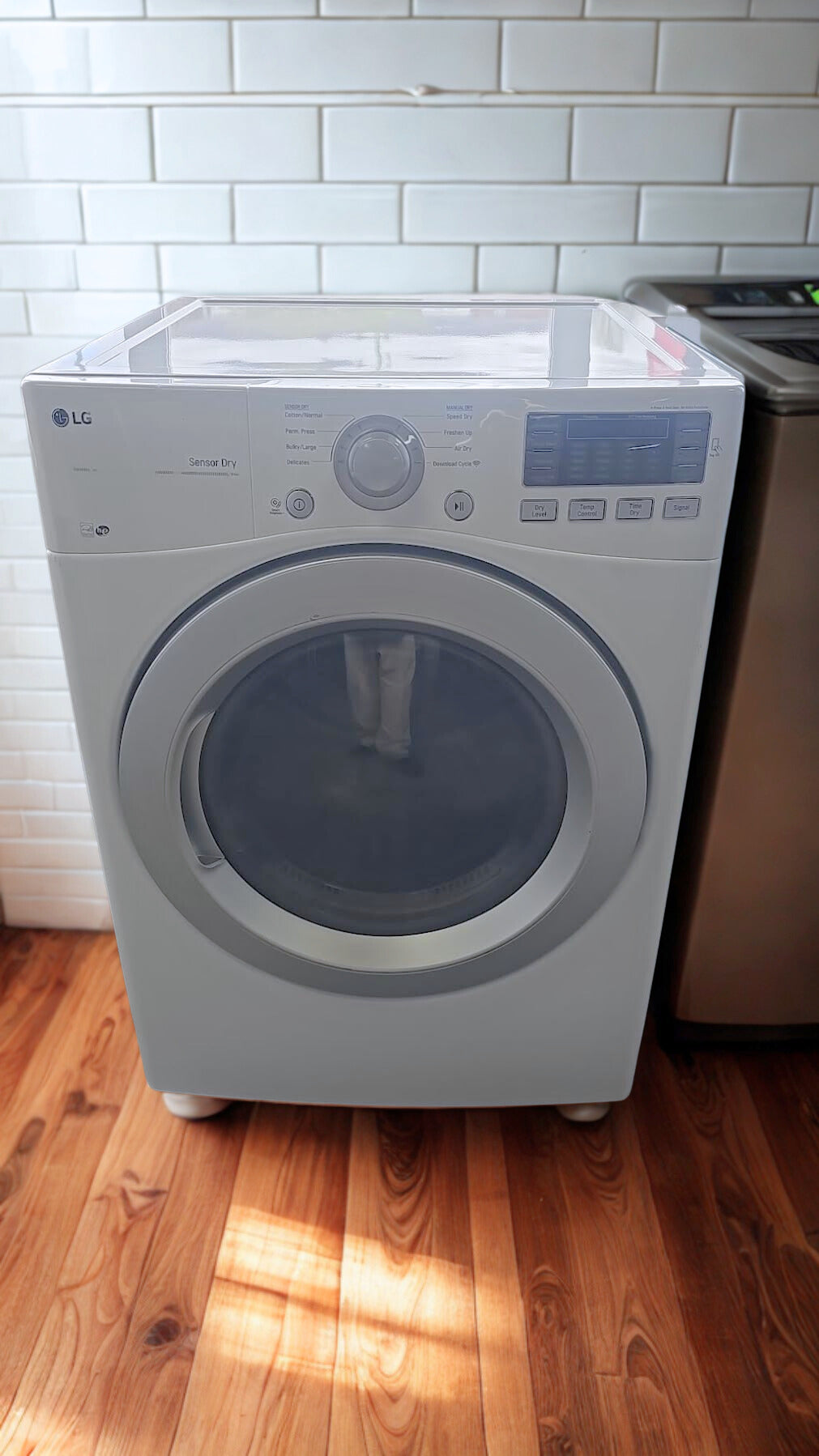LG 5.2 cu. ft. Front Load Washer & 7.5 cu. ft. Electric Dryer with Advanced Fabric Care (Models WM3470HWA & DLEX3370W)