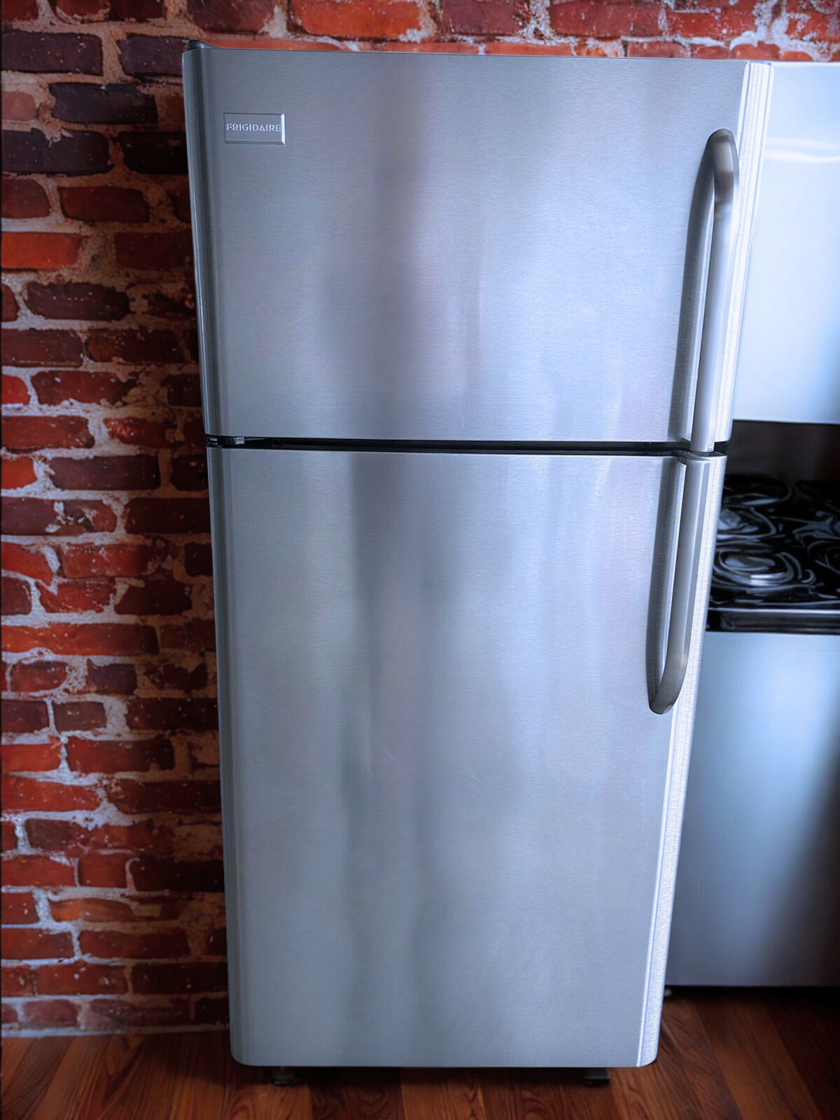 Frigidaire 18 cu. ft. Top Freezer Refrigerator with Flexible Storage Options (Model FFHT1831QS)