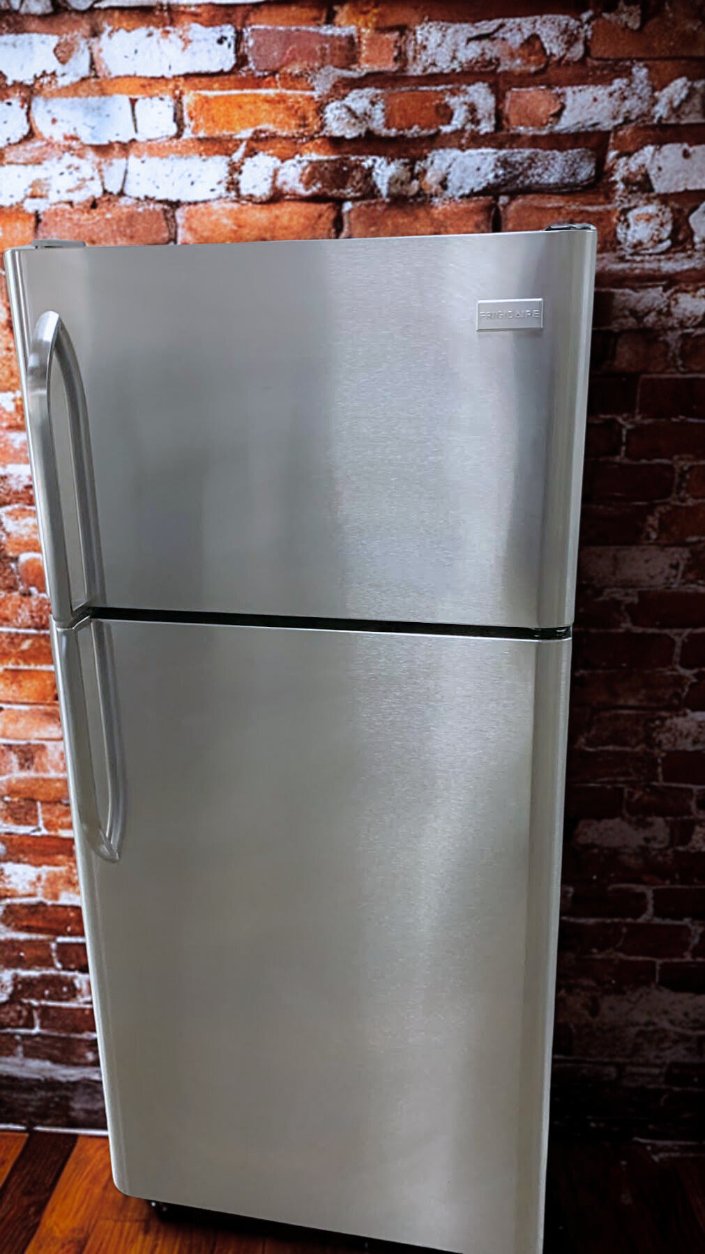 Frigidaire 18 cu. ft. Top Freezer Refrigerator with Flexible Storage Options (Model FFHT1831QS)