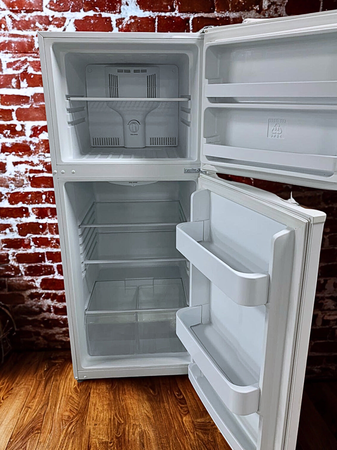 Frigidaire 12 cu. ft. Top Freezer Refrigerator with Adjustable Interior Storage (Model FFTR1222QW)