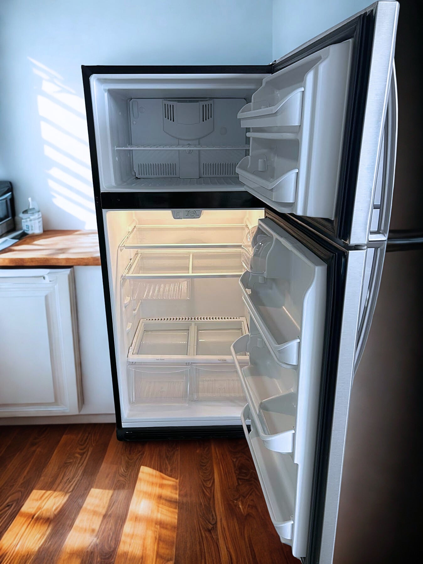 Frigidaire 18 cu. ft. Top Freezer Refrigerator with Flexible Storage Options (Model FFHT1831QS)